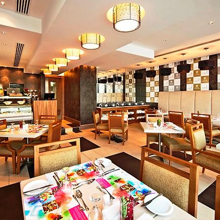 Oaks Liwa Executive Suites Abu Dhabi Ristorante foto